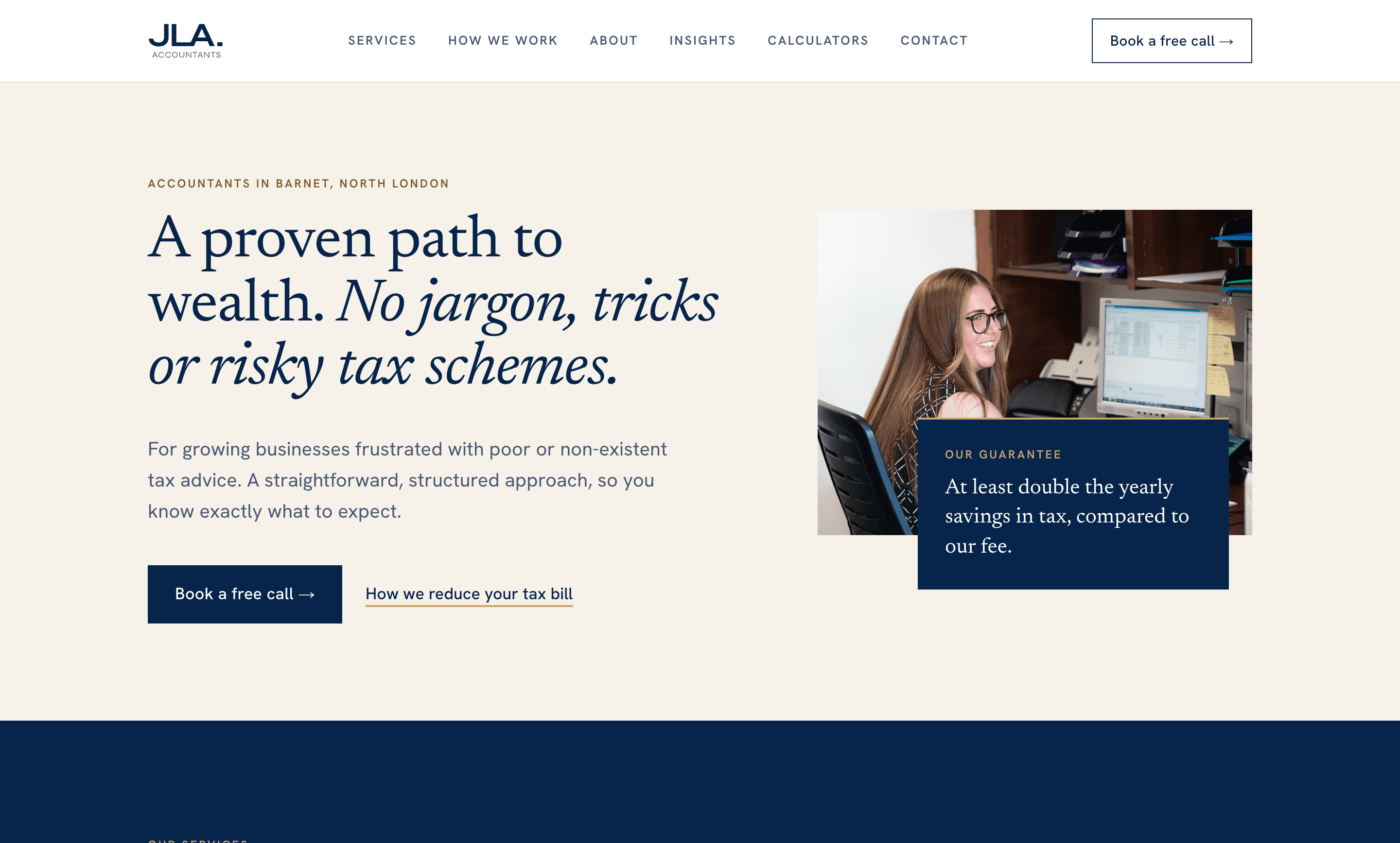 The JLA Accountants home page, with a navy serif headline on a cream ground, a photo of a member of staff at her desk, and the firm's guarantee on a navy panel across its lower edge